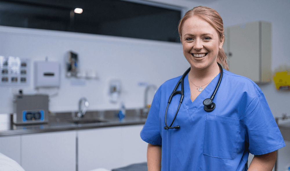 Female locum doctor smiling 